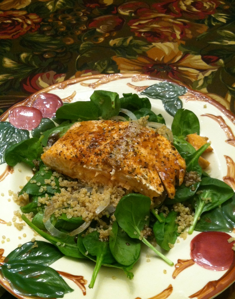 Roasted Salmon with Maple Vinaigrette on bed of fresh spinach, Vidalia onion, and quinoa.